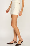 BECCA ASYMMETRIC WRAP MINI SKORT